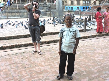 10% of the tourists that didn't cancel their trip to Nepal, an American photographer at work.