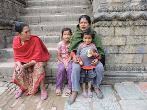 Mothers taking their children to the temples