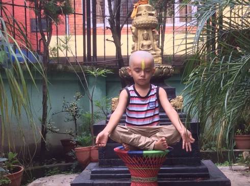 Lively little boy sitting still!