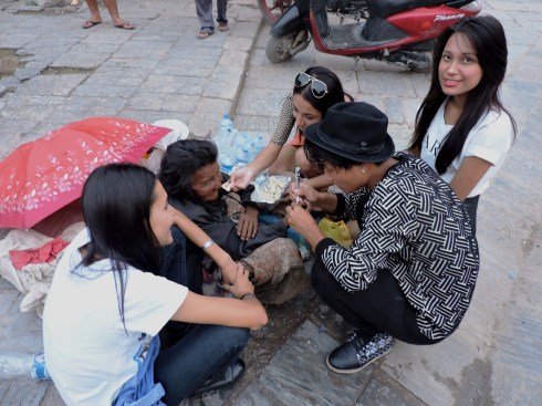 Feeding the old lady Momos