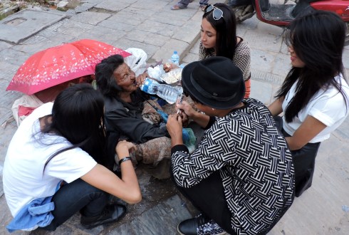 Giving her water to drink