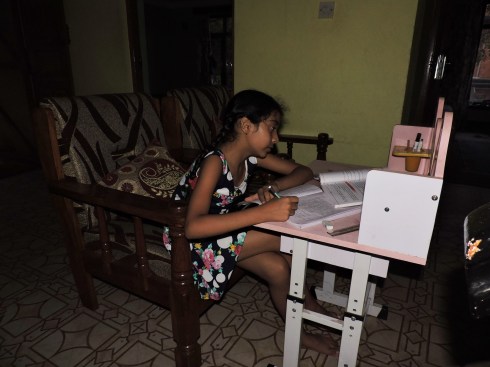 Muskan: studying in the dark during a blackout